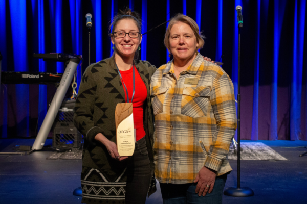 Colleen Foehrenbacher (left) receives the Outstanding New Leader Award from Jen Levy, Executive Director of the Association of Nature Center Administrators.